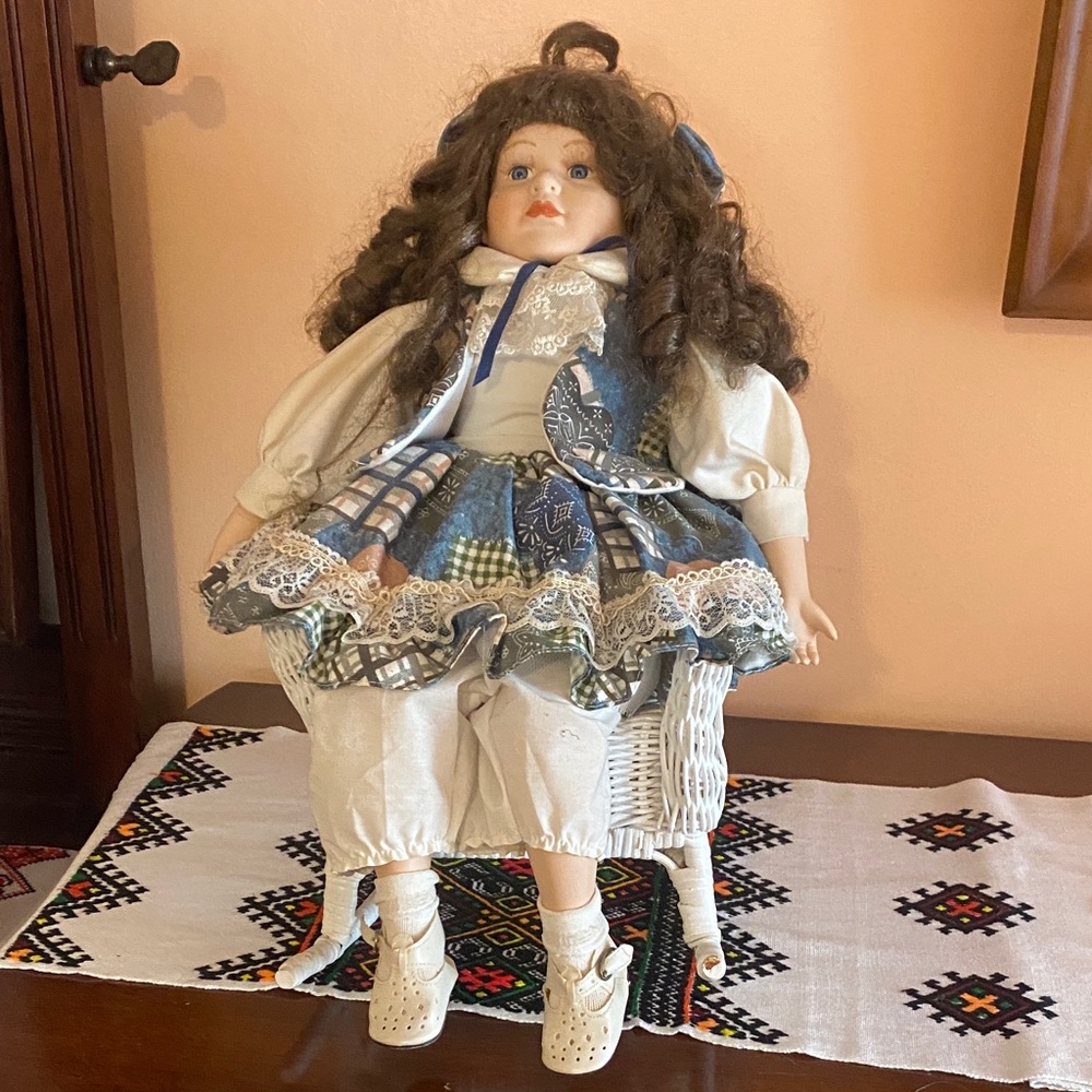 Elegant Porcelain Doll with Blue and Cream Dress